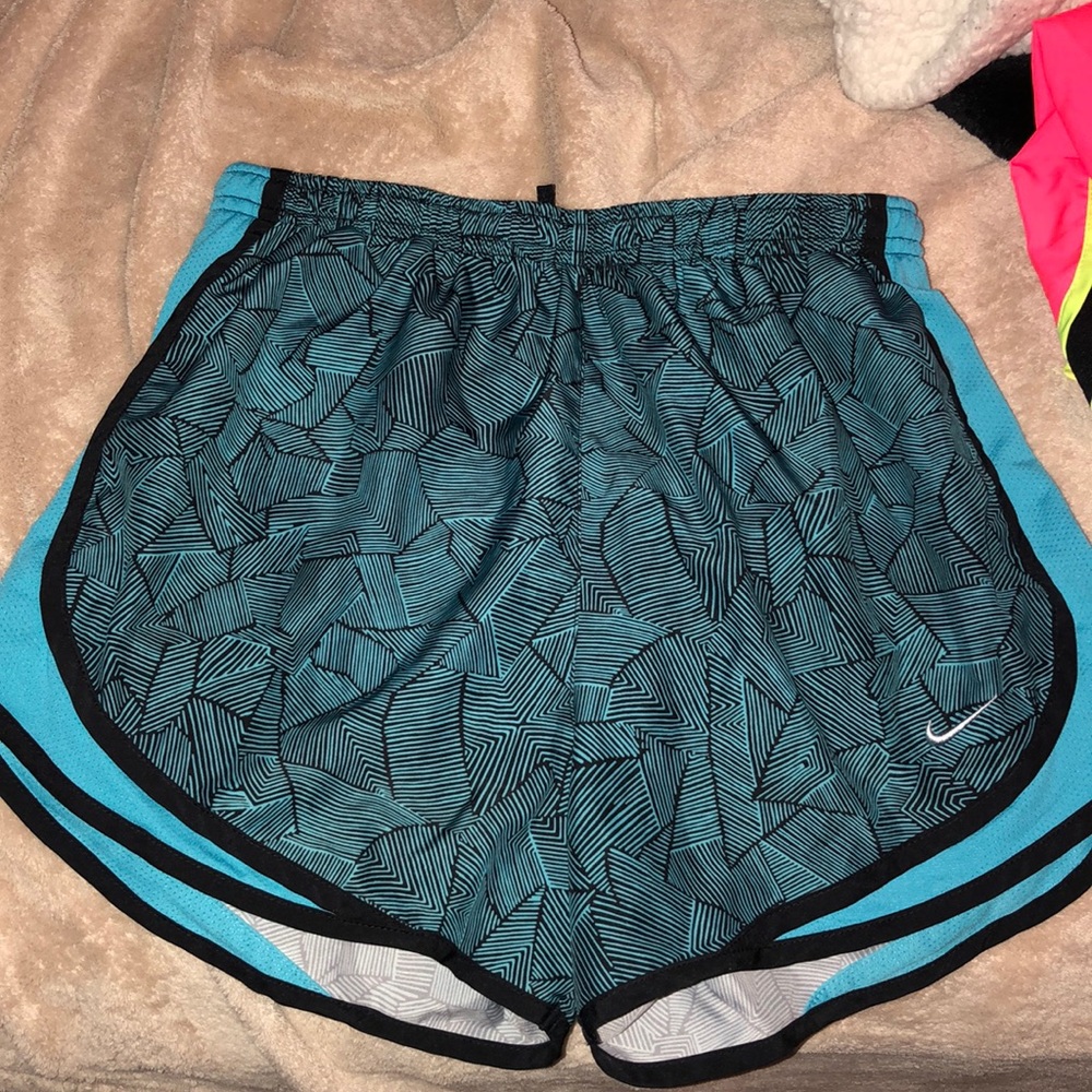 Nike workout shorts, small but fits like a medium